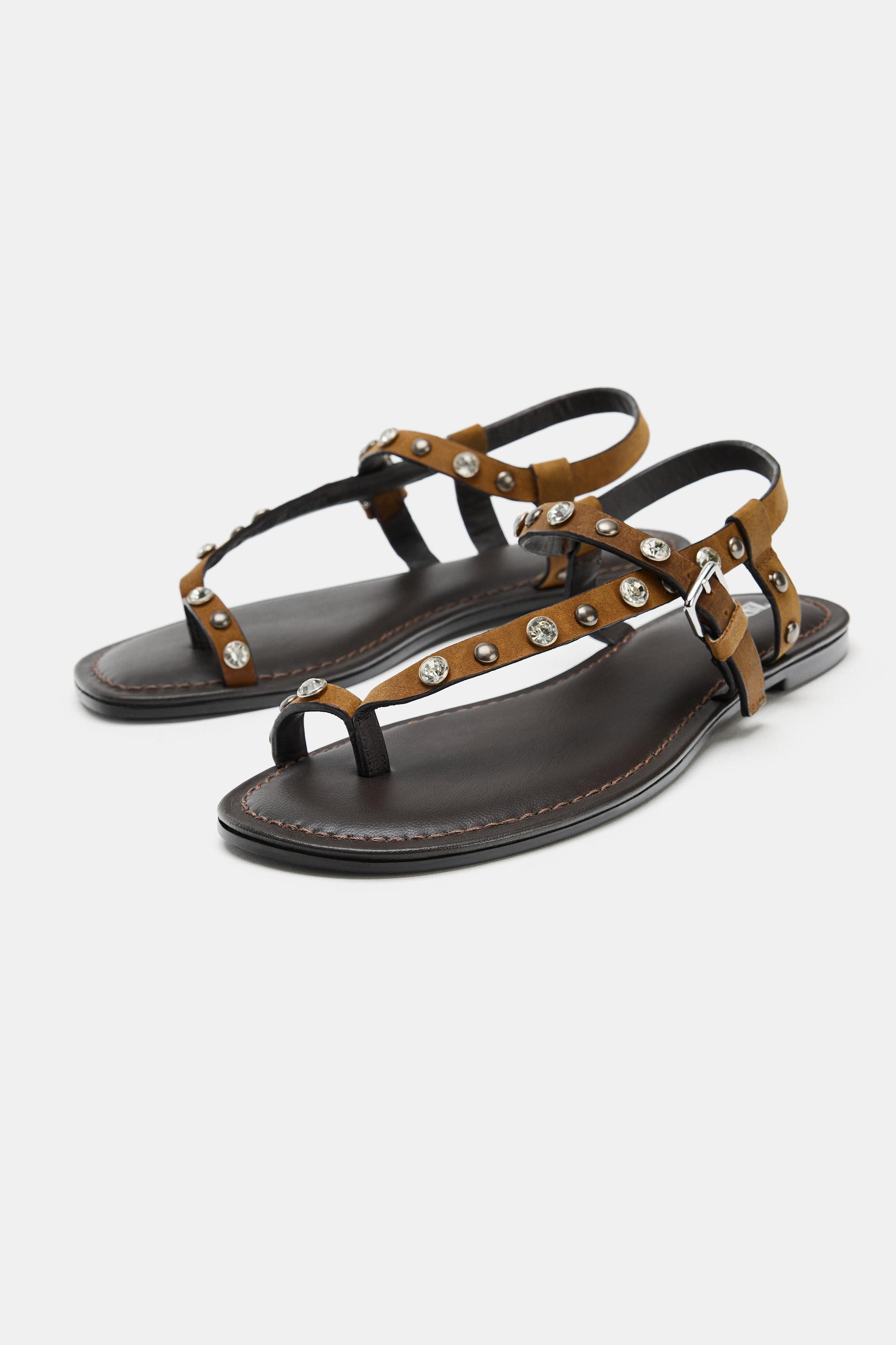 Flat split suede sandals. Upper featuring studs and rhinestone appliqu\u00e9s. Front strap with t... | Zara US