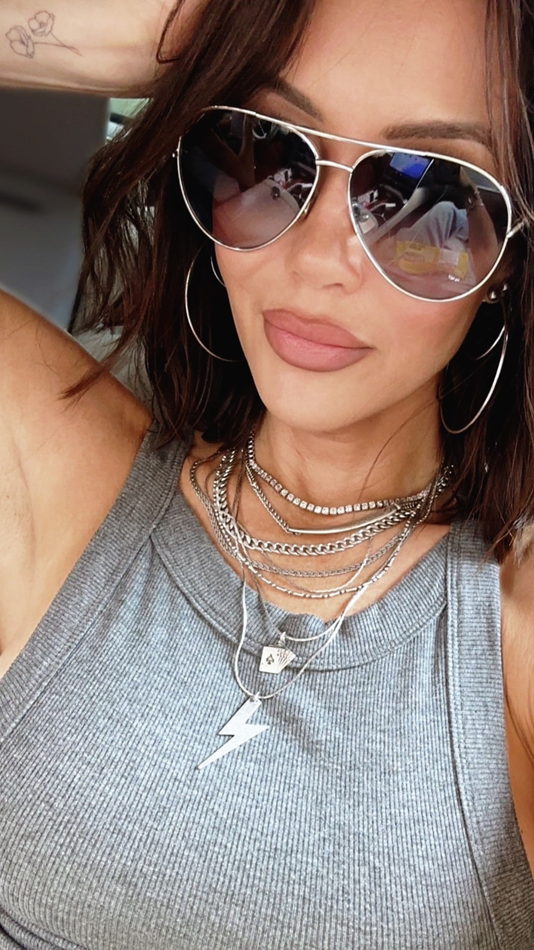 Summer means layering with accessories!  Silver chains, hoops and aviators have me feelin fine 😍

#LTKootd #LTKOver40 #LTKSeasonal