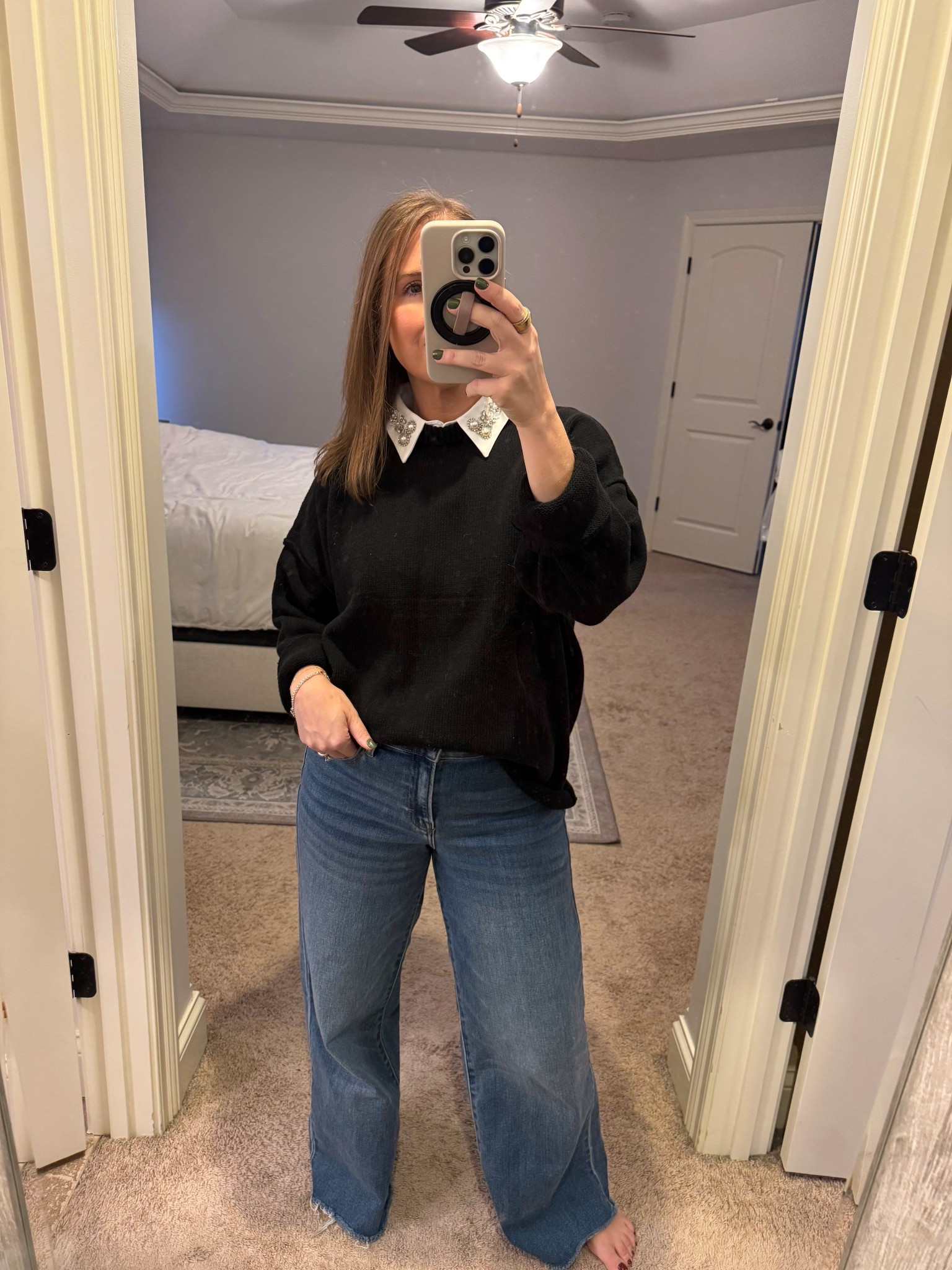 Amazon black sweater
Vici jeans

