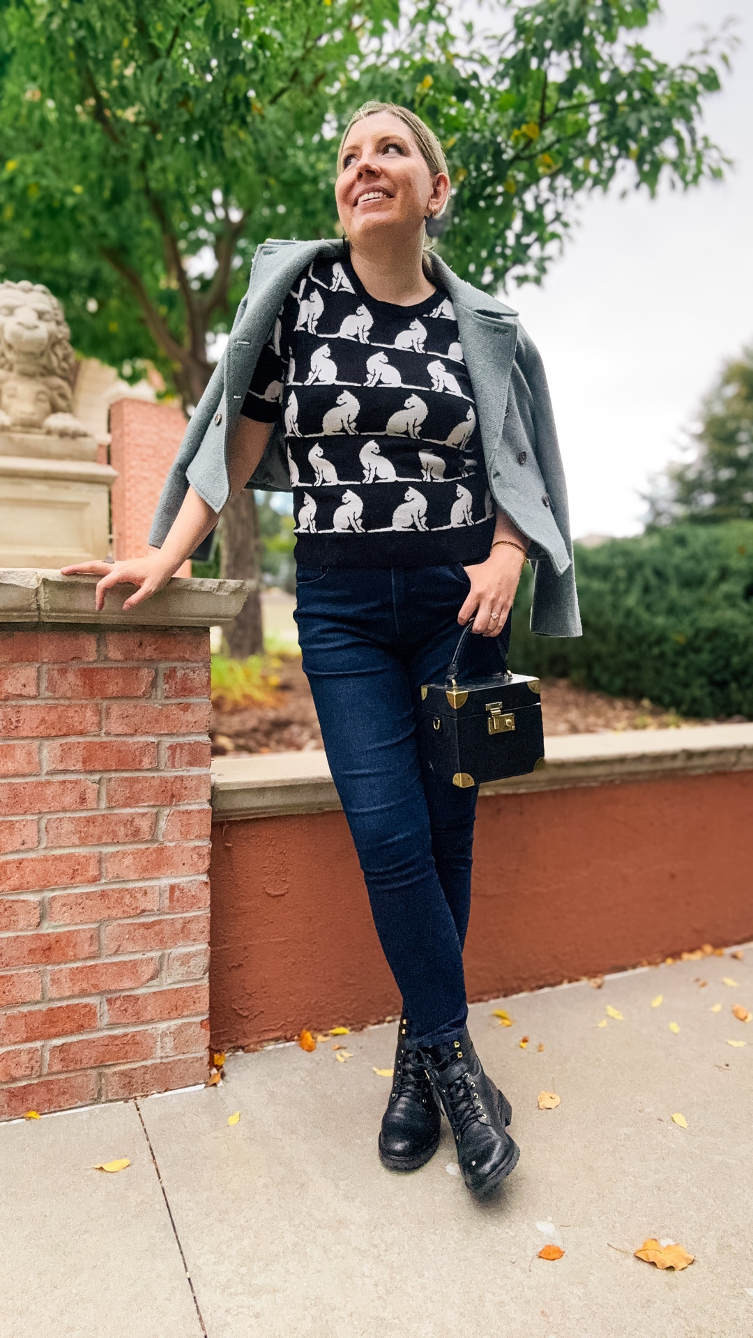 Look 2 - Heritage Hall
A curated style series

A little Halloween magic, Heritage Hall style. 🐈‍⬛✨

My love of Halloween has waxed and waned throughout time but my love of black cats has remained constant. Voila: this look.

Heritage Hall is part of my capsule series  - curated two-week wardrobes built around a mood, color story, or theme. This one blends classic prep with whimsical autumn hues and motifs, perfect for elevated leisurewear through fall.

Earrings - Le Chic Miami (linked)
Sweater - Anthropologie (Maeve) (second hand option linked)
Jacket - Lauren Ralph Lauren
Jeans - Express (similar linked)
Bag - Dillards (linked)
Boots - Lauren Ralph Lauren (brown color linked)
Ring - Vintage (Target?)
Bracelet - Rocksbox


#LTKStyleTip #LTKSeasonal #LTKHalloween