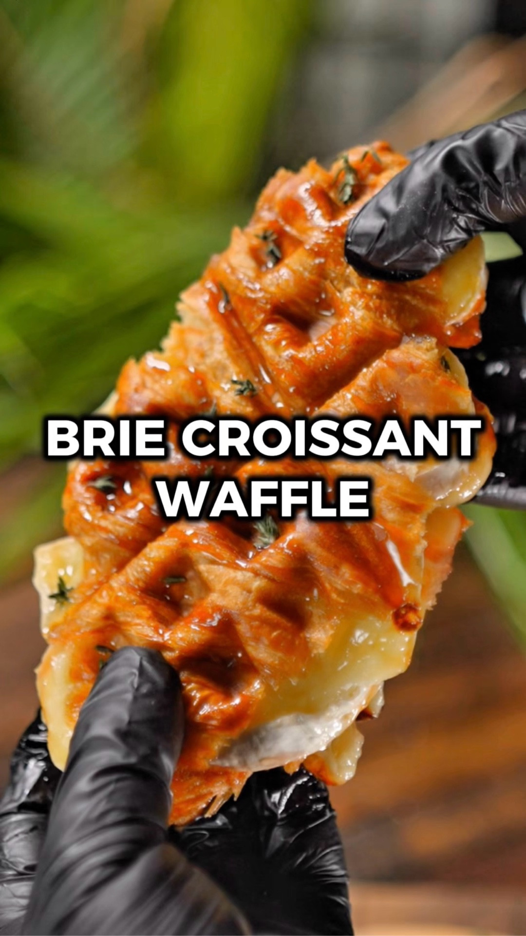 If you like croissant sandwiches, this brie croissant waffle is about to blow you away! 😋

The outside is crispy with a thin caramelized honey layer, and the middle is gooey from the melted brie, sweet from the fruit jam, and the thyme adds an herby aroma that ties it all together.

Would you try it? Let me know in the comments what you think if you do! 🙌

INGREDIENTS
1 croissant
1 tbsp of jam (any fruity jam works)
3 slices brie
honey (to taste)
1 tsp fresh thyme

INSTRUCTIONS
1️⃣ Use a bread knife to cut the croissant in half.
2️⃣ On the bottom half, spread on a layer of jam. Add the brie, a drizzle of honey, and a sprinkle of thyme on top. Place the top half of the croissant on, and drizzle a little more honey on top.
3️⃣ Preheat the waffle maker, then place the croissant in and close it. Cook for a few minutes until golden brown.
4️⃣ Plate it, let it cool for a minute or two, and enjoy!

#LTKfoodie #LTKHome