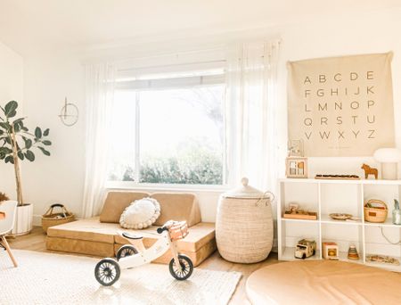 The playroom that has everything a kid needs to thrive...organization, storage baskets, kids couch, Montessori play, plants… 

#LTKhome #LTKfamily #LTKkids