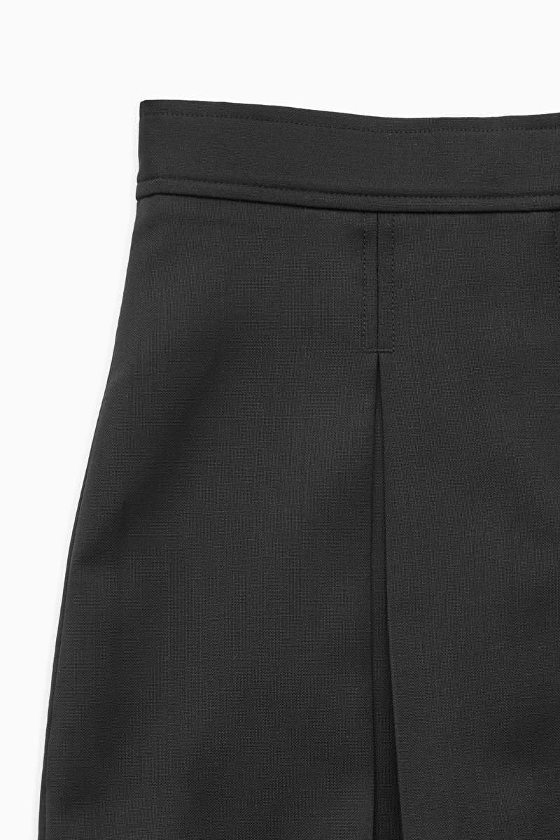HomeSkirtsLOW-RISE PLEATED WOOL MINI SKIRT | COS UK