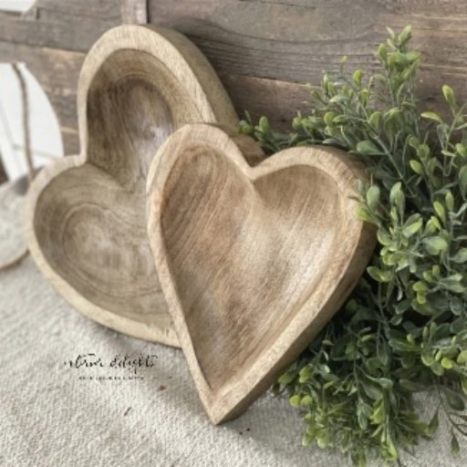 This beautiful set of wooden carved hearts makes a great gift and looks beautiful on any flat surface or propped in the background of a shelf. There are little felt pads on the back to prevent scratching. #valentinesdaydecor #woodenhearts #rusticwooddecor 

#LTKValentine #LTKSeasonal #LTKHome