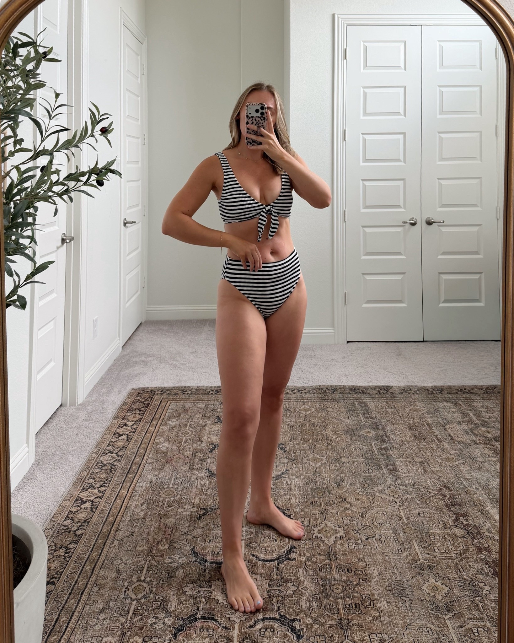 Not me finding the most flattering striped bikini at Walmart… 👀
The fit?? So good. The tie-front top gives the cutest shape and the high-waisted bottoms are actually comfy + smoothing 🙌🏼

Black & white stripes = always a yes 🤍 such a classic, expensive-looking set

Wearing a size M and I’m typically a size 6—fits true to size with great coverage ✨

10/10 for pool days, beach trips, and chasing a toddler without adjusting every 2 seconds

#LTKswim #walmartfashion #walmartfinds #midsizestyle #momstyle #affordablefashion #summerstyle 
