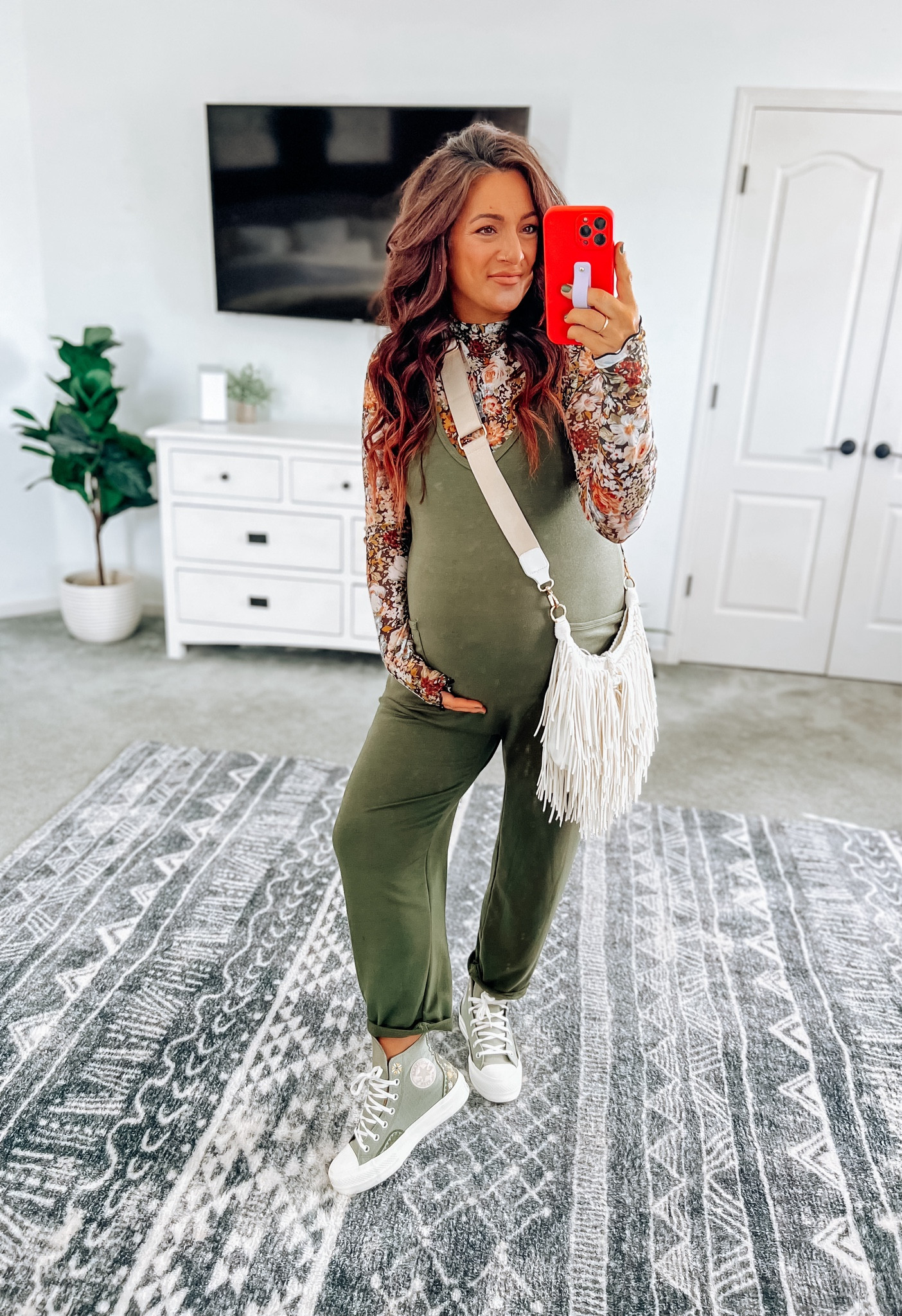 Look for less jumpsuit styled for a cute Fall outfit! Non maternity, but oversized making it bump friendly 👌 looks cute with a tank, short sleeve, long sleeve, plaid around your waist, sandals, or tennis shoes and a denim jacket! 

#LTKStyleTip #LTKFindsUnder50 #LTKBump