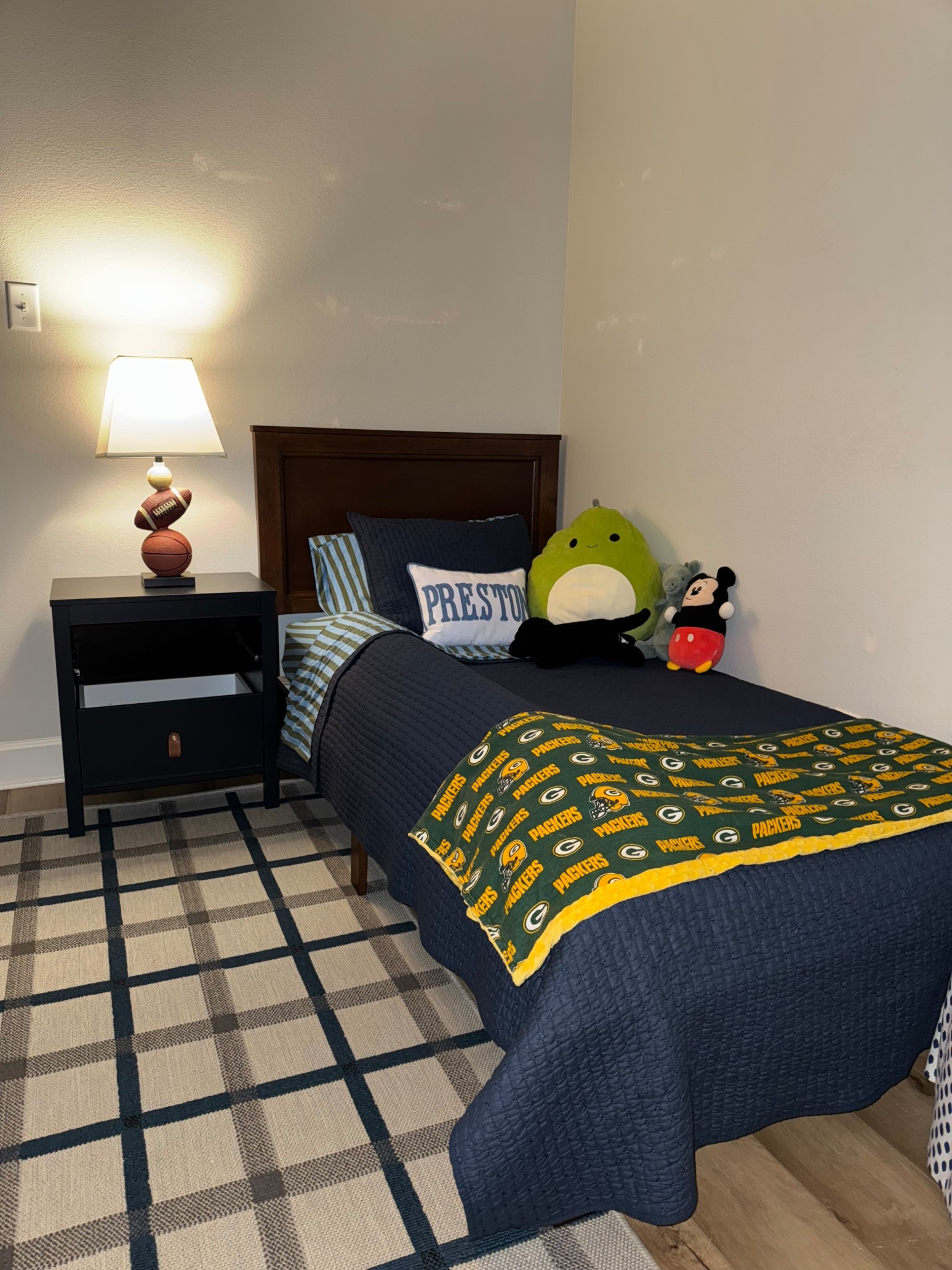 The beginning of Preston’s big big room 🥹 

Toddler bed / navy bedding / striped sheets / sports theme / neutral boy 

#LTKHome