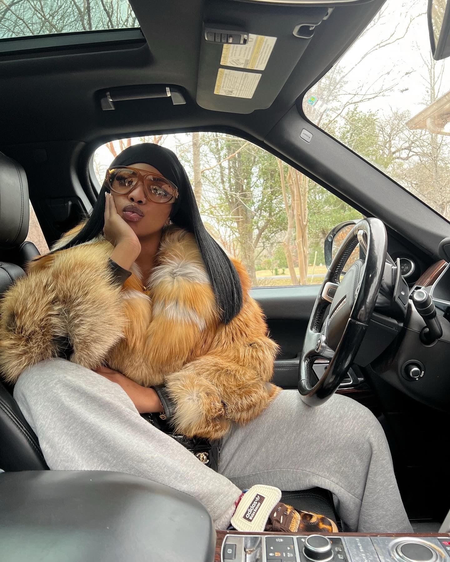 Y’all ever seen a baddie mix luxury & loungewear this effortlessly? 
Fur coat? Vintage and extra. 
Sneakers? Loud and wild, just like my energy. 
Sittin’ pretty in my whip like it’s a runway. 
Cuz baby, when you’re the vibe—you don’t chase the mood, you are the mood. 💋🐆🚘

#FurOnGraySweats #StreetwearSavage #BaddieInTransit #DearraStyle #LTKFit #LTKWinterStyle

#LTKStyleTip #LTKPetite #LTKOver40
