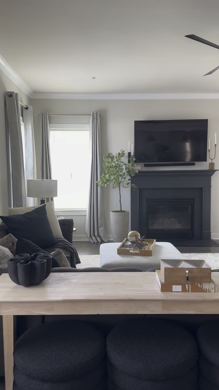 We chose @behrpaint 2024 color of the year for our fireplace refresh, and we love how it turned out! #crackedpepper is a black with gray undertones, so you can see a great moody contrast that isn’t overwhelming and still brings a sense of calm…if you know me, you know I’m all about calm lol. Since the fireplace surround is wood trim we opted for a satin sheen for a smooth finish with a bit of shine. It’s also durable and easy to clean! I’m definitely going to need a moody wall or two with this color!

#LTKhome #LTKVideo