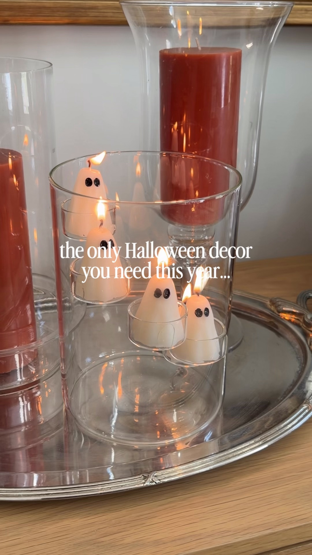 How adorable is this glass hurricane. This even comes with the ghost candles.

#LTKSeasonal #LTKHome