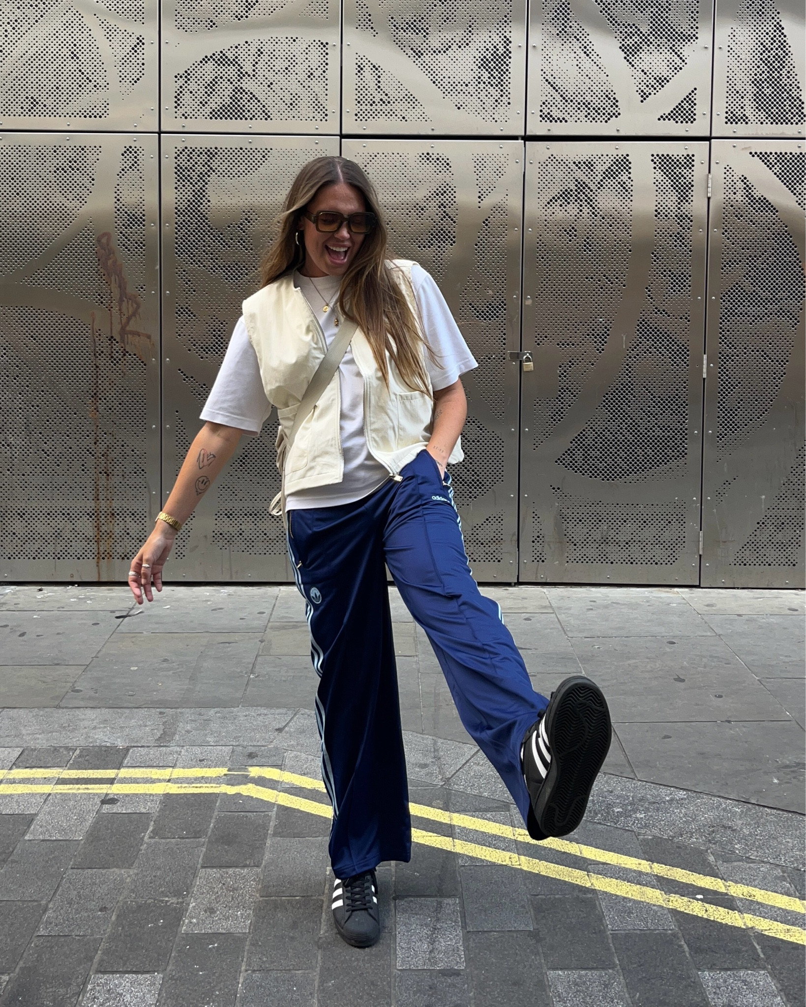 Comfort + looking like you made an effort 😙 Wearing a boxy white Uniqlo t shirt with a cream gilet over the top, navy Adidas firebird trackpants and Adidas Superstars with a Uniqlo crossbody bag

#uniqlo #uniqlooutfit #boxytee #casualoutfit #tomboystyle #tomboyoutfit #adidasoutfit #gilet

#LTKeurope #LTKstyletip #LTKuk