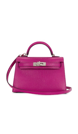 FWRD Renew Hermes Chevre Kelly 20 Handbag in Fuchsia,Purple. | Revolve Clothing (Global)