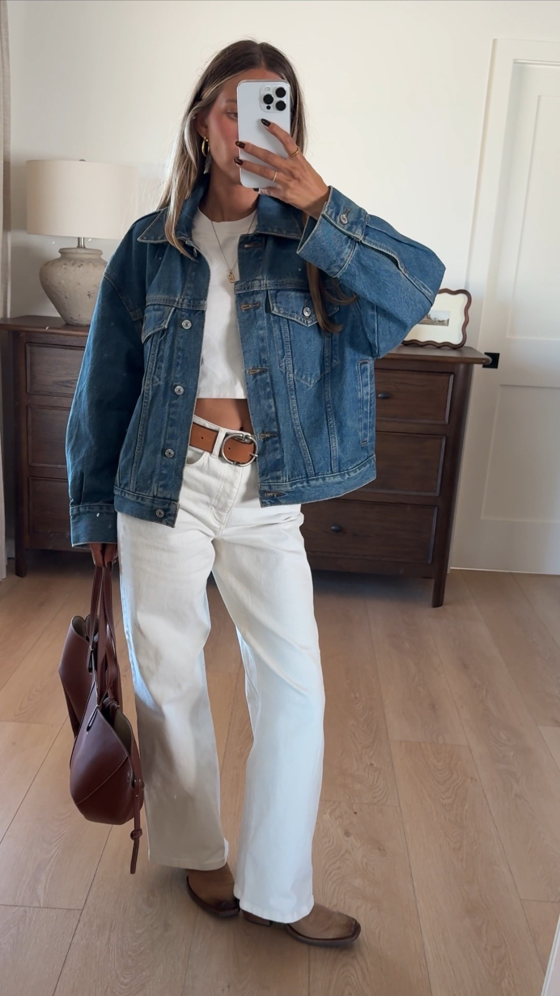 Denim on denim 🤝 The oversized denim jacket is a timeless layering piece - perfect with a cropped tee, wide leg white jeans, and classic leather accessories. Effortless fall vibe. 

#LTKfall #LTKdenim #LTKstyle #capsulewardrobe #falloutfit #neutralstyle

