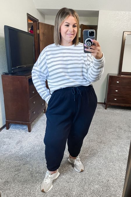 Curvy + pear shaped OOTD - mom life on spring break edition! 😉 Our favorite sweatpants are 50% off and these comfy lightweight sweatshirts are 30% off. Both items come in regular and plus sizes! These sweatshirts also come in lots of colors and remind me of Aerie! I can wear them in any size from XL-2X depending on how I want them to fit. Sweatpants I can wear in XXL or 2X.

Midsize outfit, plus size outfit, old navy sale, Maurice’s sale, mom outfit, casual outfit 

#LTKplussize #LTKfindsunder50 #LTKsalealert