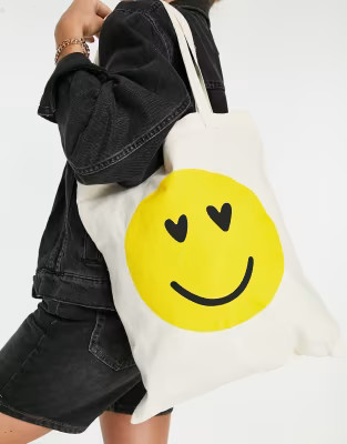ASOS DESIGN tote bag with happy face print in natural | ASOS (Global)