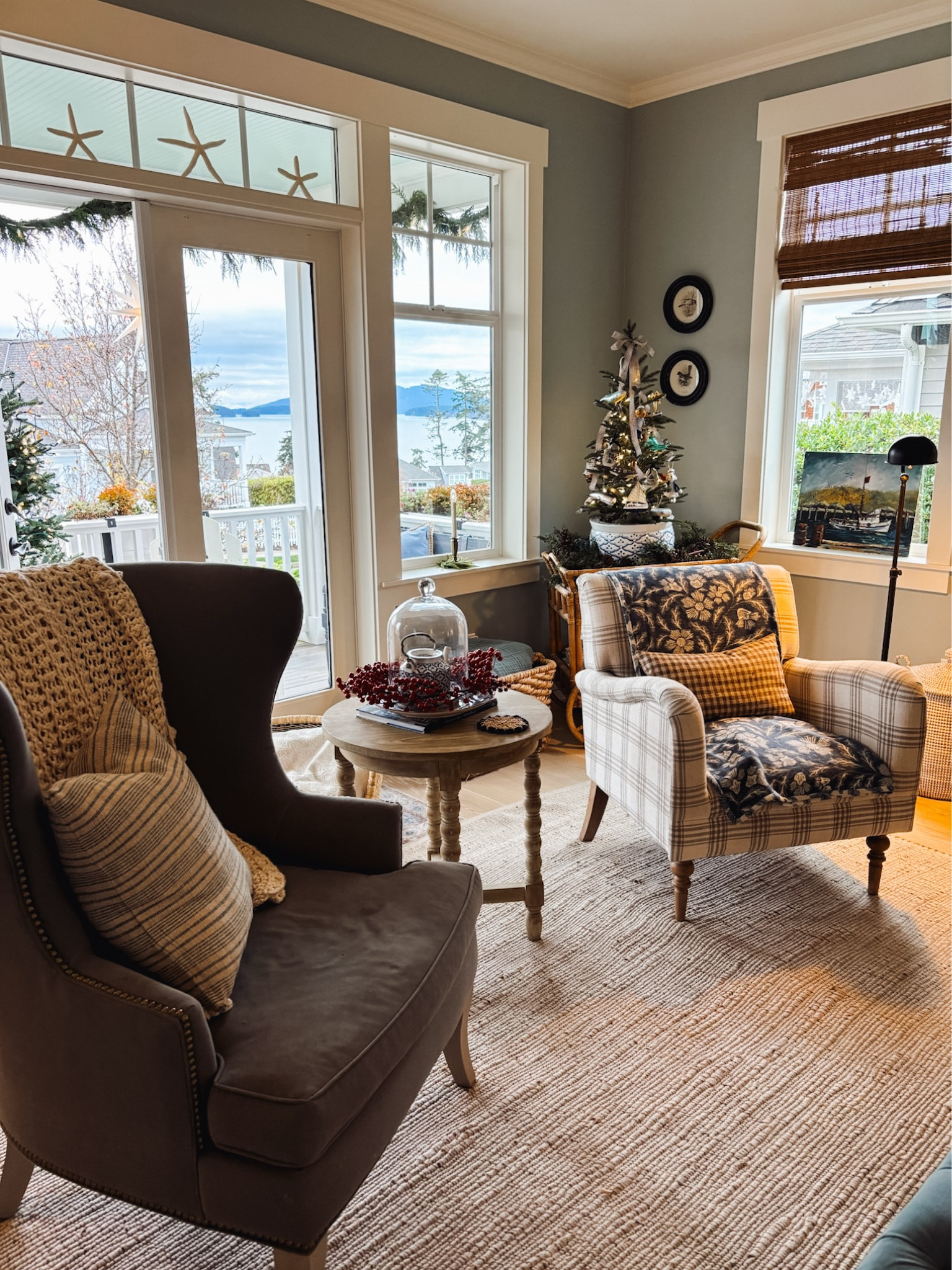 Christmas living room, chairs, wingback, plaid chair, bamboo shades, spindle leg accent side table, jute cotton rug, cloche and red berries 

#LTKHoliday #LTKSaleAlert #LTKHome