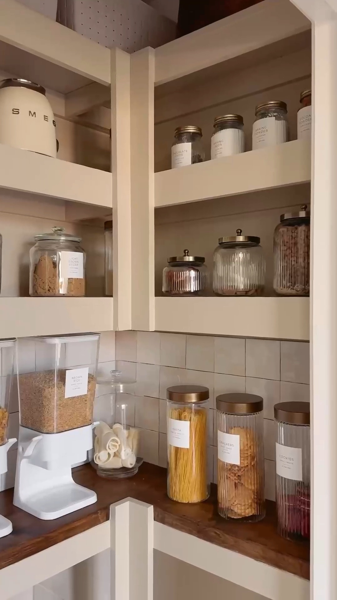 The inspo → the before → the AFTER! ✨

From ribbed glass cannisters to cereal dispensers, I've linked all of my go-to pantry storage items.

People always ask what I store in here - maybe I should do a pantry tour next? Let me know in the comments!

#kitchenideas #kitchenhacks #kitchenhack #pantry #pantryorganization #pantrydoor #kitchendesignideas #kitchendetails #Vintagekitchen #kitchenhardware #cabinethardware #homeaccount