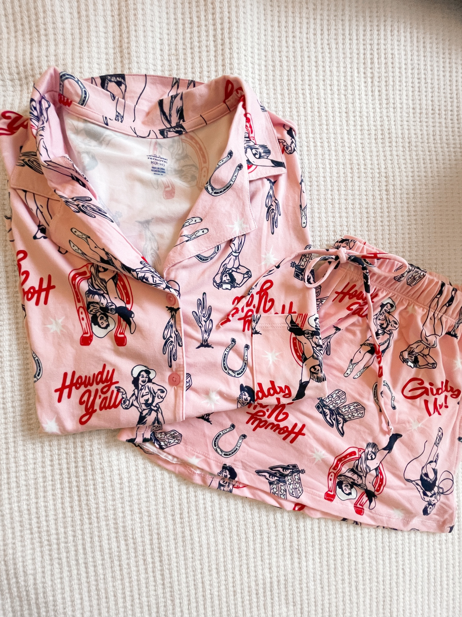 The cutest baby pink cowgirl pajamas from Walmart I went with a size medium 🌸🎀🤠