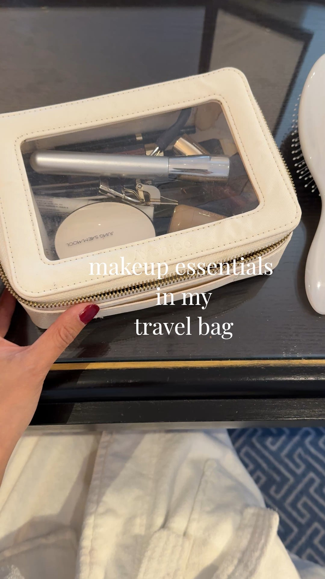 Travel style. Makeup essentials in my travel bag. Quick makeup routine  
- Clear makeup bag is great for travel for its size, durability, and easy to see what you have in it. I also have the bigger size and keep them on my bathroom counter since they look pretty too. 
- Cushion foundation is a great clean-er option Kbeauty product. Won’t crack or spill during travel. Easy to use pat on formula that leaves a dewy finish. 
- Brow pencil and brow gel are a must for me.  I always keep a backpack brow pencil in my bag too. 
- Clean beauty mascara that has been my all around favorite for years. I just got it in the dark brown color and love that shade for daytime no makeup look. 
- Blush stick is another easy to travel beauty product because it won’t spill or crack. My shades are  tan line or toasted teddy. 
- Lip oil that has color like a lip gloss. I layer over lipstick for more impact. These clean formulas have also been my go to for years. My newest color additions are lipstick in ginger peach shade  and lip oil in biarritz. 
- Eye shadow sticks are quick and easy to use. I use for evenings  Lasts all day. Swipe on and blend quickly with finger  

#LTKOver40 #LTKBeauty