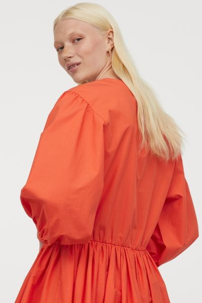 Short, voluminous dress with a deep V-neck that has a concealed hook-and-eye fastener. 3/4-length... | H&M (UK, MY, IN, SG, PH, TW, HK)