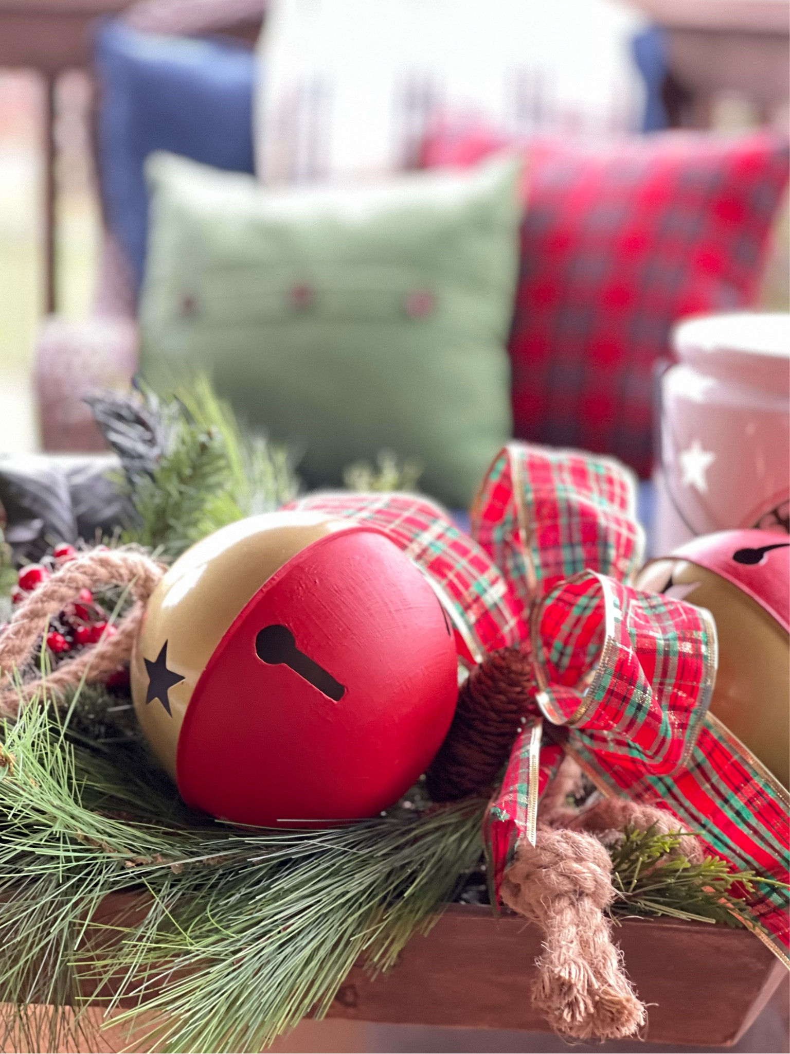 Create a festive Christmas porch with a dough bowl full of greenery and large jingle bells. Don’t forget the classic red Tartan plaid for a cozy classic Christmas look!

#LTKHoliday #LTKSeasonal #LTKhome
