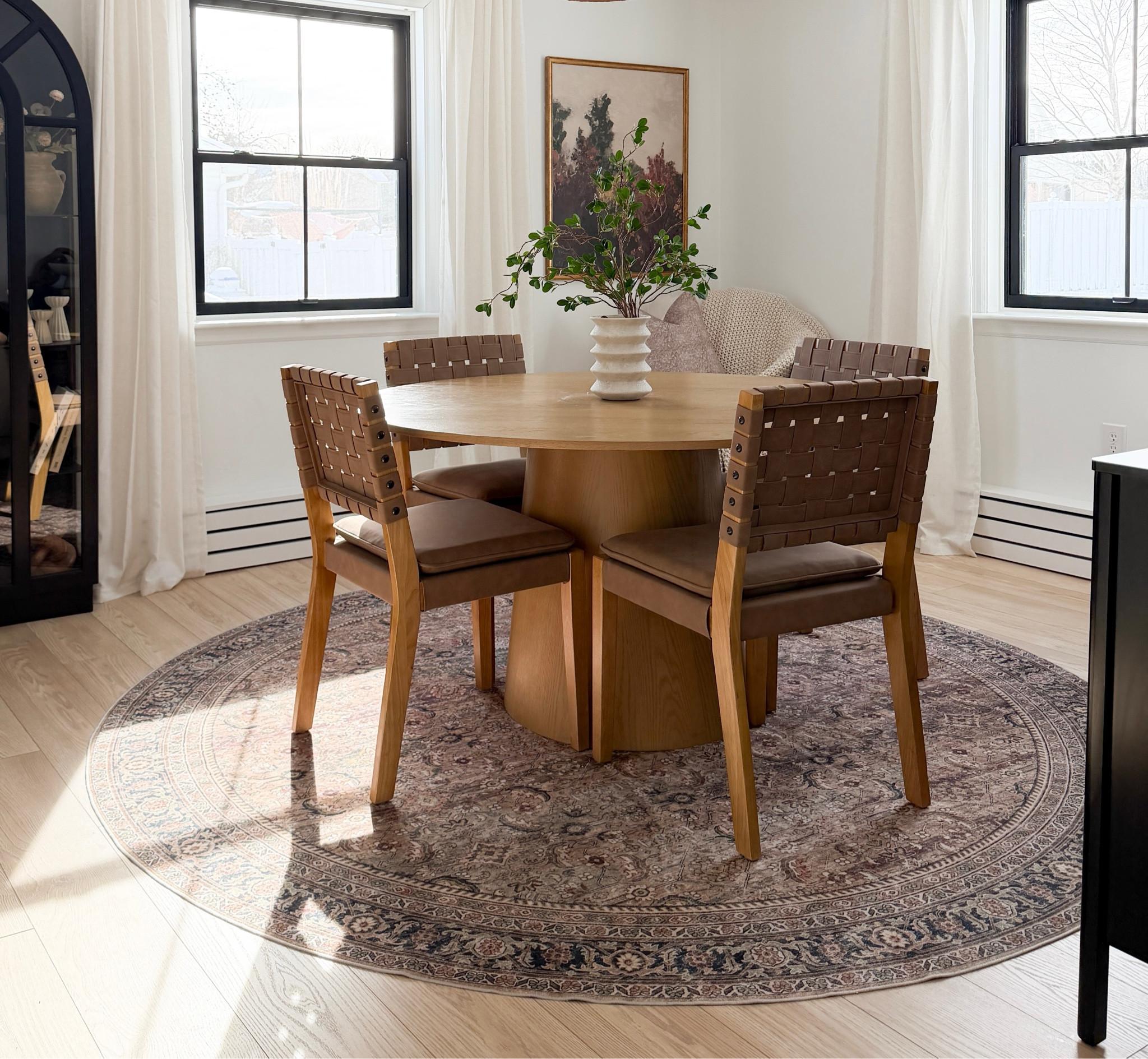 Our dining room refresh reveal! I am in LOVE with our solid oak round pedestal dining table from Wayfair & these beautiful modern wooden dining chairs from Amazon! 

#LTKHome
