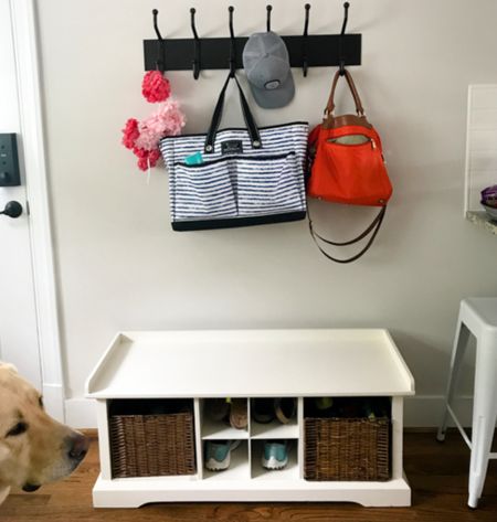 This mudroom spot worked well enough for us for years thanks to this great bench (which will now be our fitness room bench) and the best pottery barn hooks!! So solid! We will rehang them in the new mudroom  

#LTKsalealert #LTKhome