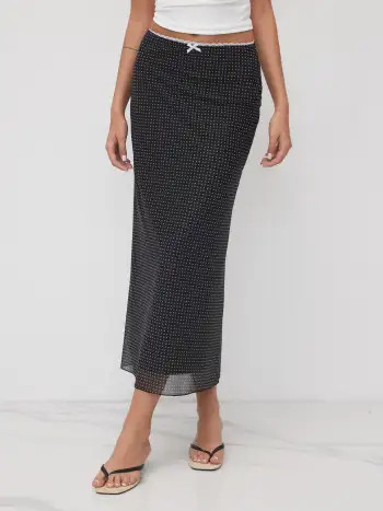 Jupe longue en maille, à taille moyenne, avec nœud papillon et pois | Cider