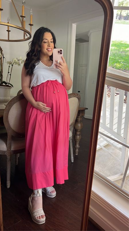 A beautiful bright skirt perfect for summer! Love the light weight of this skirt and I did size up 1 to fit over my belly and for maternity. Comes in other colors and pairs well with neutrals but would also be fun with bright prints for summer vacations!

#LTKtravel #LTKbump #LTKSeasonal