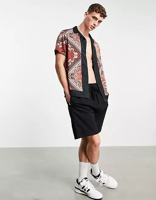 ASOS DESIGN relaxed revere shirt in bandana print with block border | ASOS (Global)