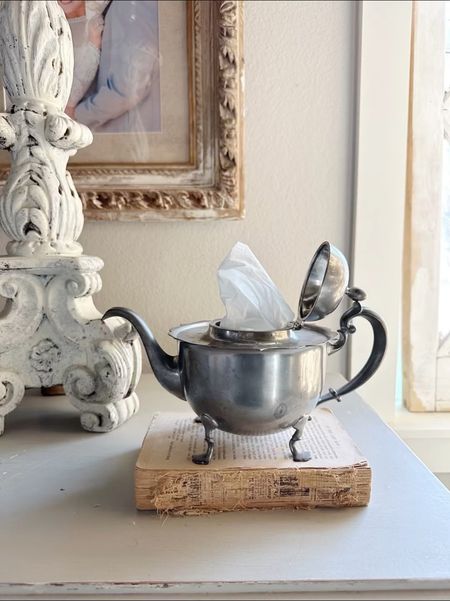Have you seen this great tissue holder idea?
I’ve seen it done with a vase with a small opening at the top, but when I found this vintage teapot with a hinged lid, I thought it was perfect! 

#tisseholder #tissuehack 

#LTKstyletip #LTKunder50 #LTKhome