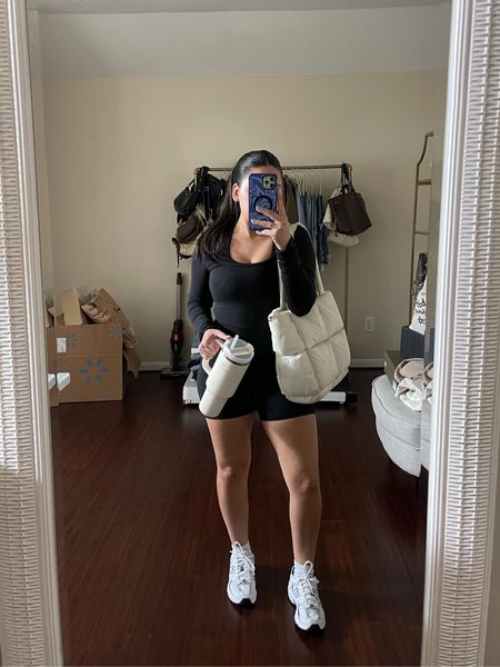 Pilates class outfit 
Long sleeve scoop neck biker unitard: small 
New balance 530 sneakers: 4.5 men 
White ankle socks 
Puffer tote bag 
Stanley cup 

#LTKActive #LTKxMadewell #LTKSeasonal