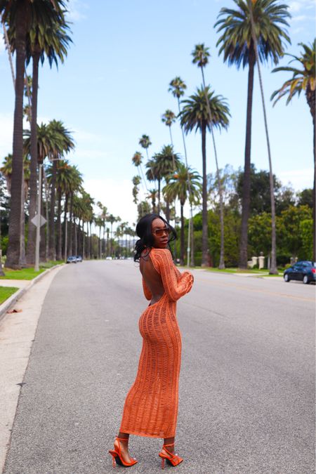 The most gorgeous backless dress that’s actually a beach cover up! The colour is stunning! Orange crochet is so stunning 

#LTKstyletip #LTKtravel #LTKeurope