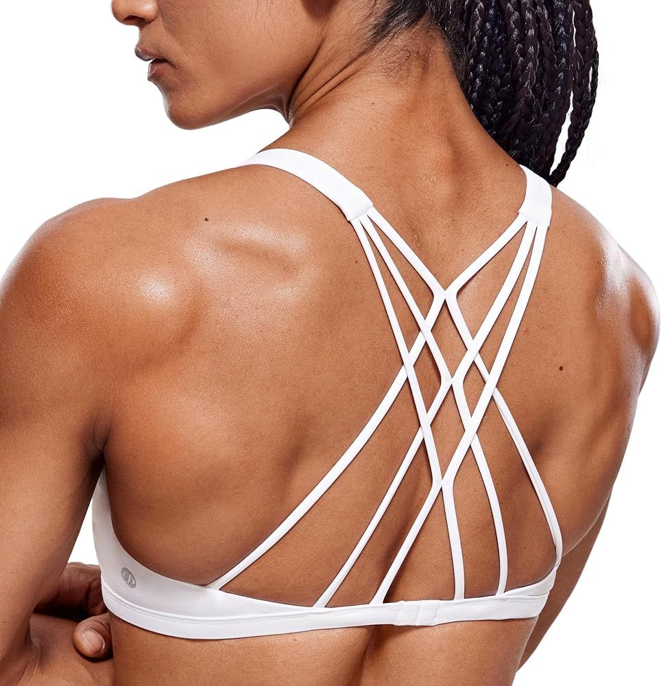 CRZ YOGA Women's Strappy Sports Bra - Criss Cross Back Padded Medium Support Wireless Gym Bra Sex... | Amazon (US)