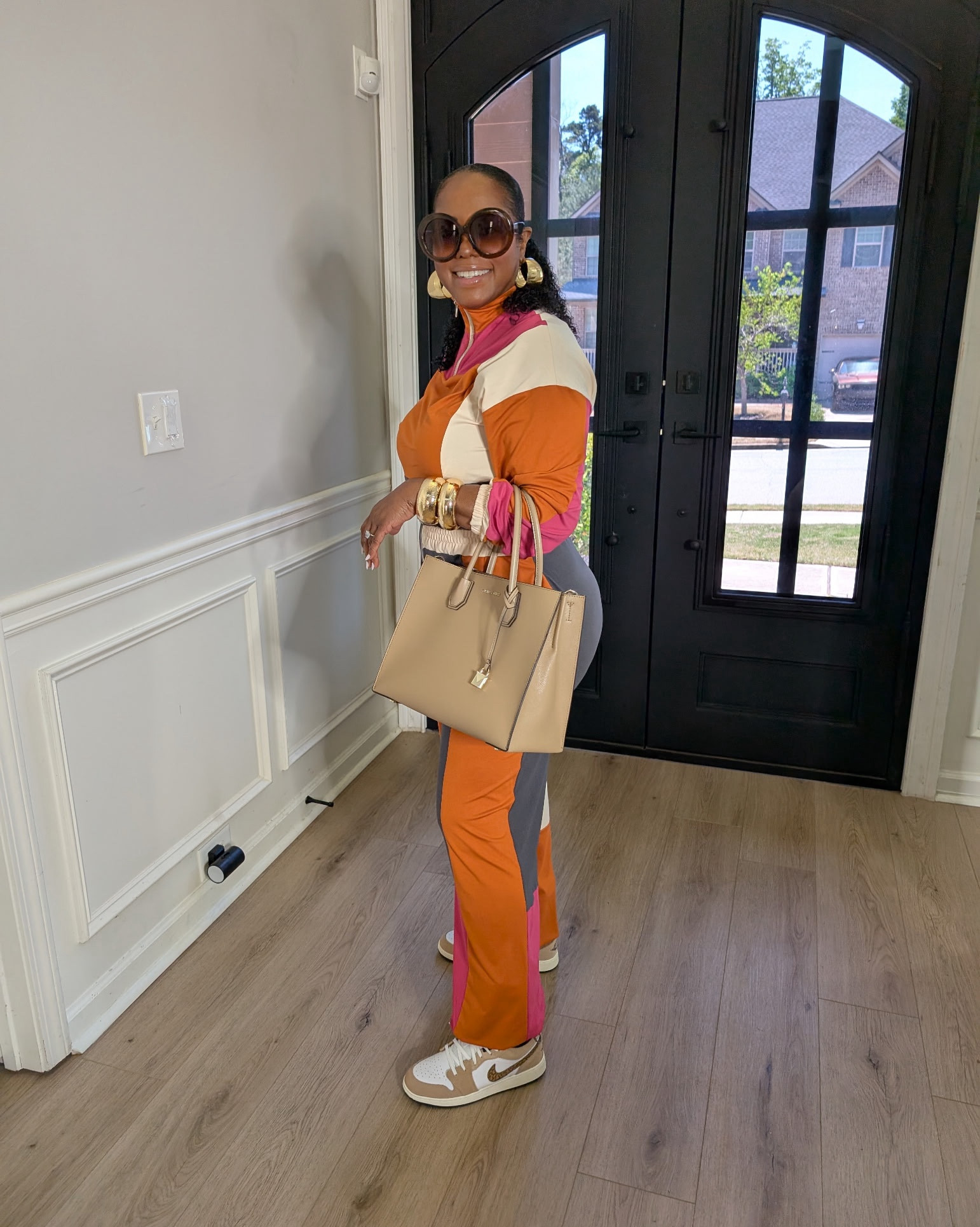 Colorblock chic, but make it luxe. This set gives me effortless cool with its bold mix of tones, and I kept it grounded with my Jordan 1 Low SE kicks. To balance the sporty vibe, I brought in structure with my Michael Kors tote—because versatility is always the assignment.

✨ Style tip: Pieces like these transition seamlessly from errands to brunch when you let the accessories set the mood.

This fit runs tts. I went with a large for comfort and flow  

#LTKShoeCrush #LTKOver40 #LTKActive