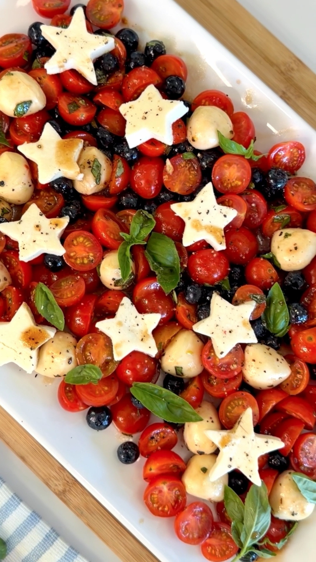 Easy 4th of July appetizer recipe idea for Caprese salad. Full recipe on best friends for frosting

#LTKfoodie #LTKSeasonal