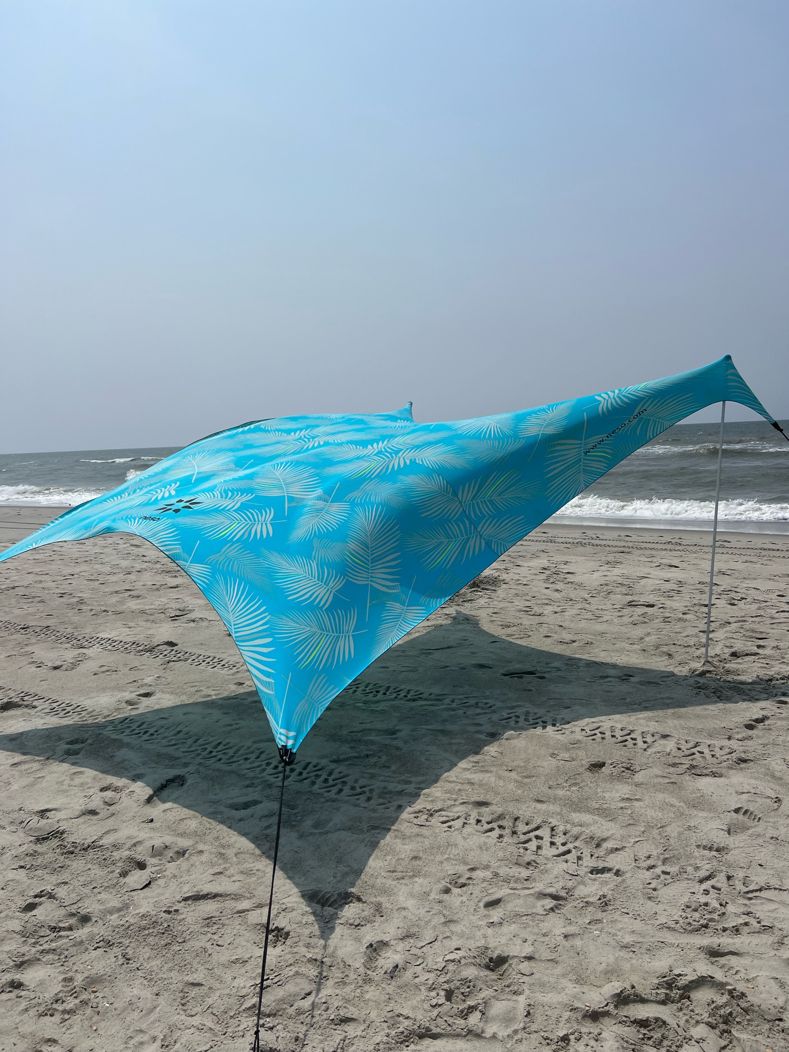 Neso beach tent - light weight and no wind required for shade 

#LTKtravel #LTKfamily #LTKSeasonal