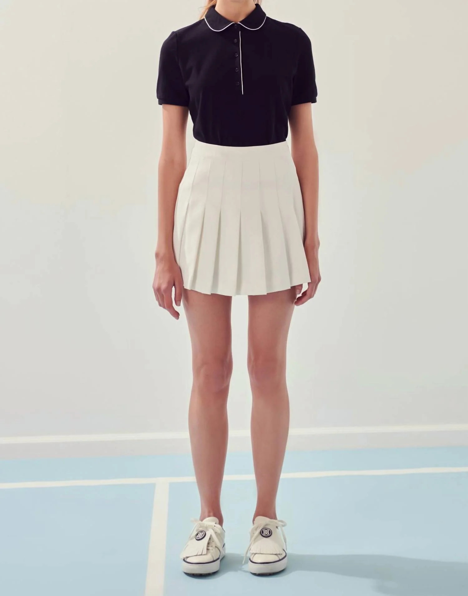 Pleated Tennis Skort In White | Shop Simon