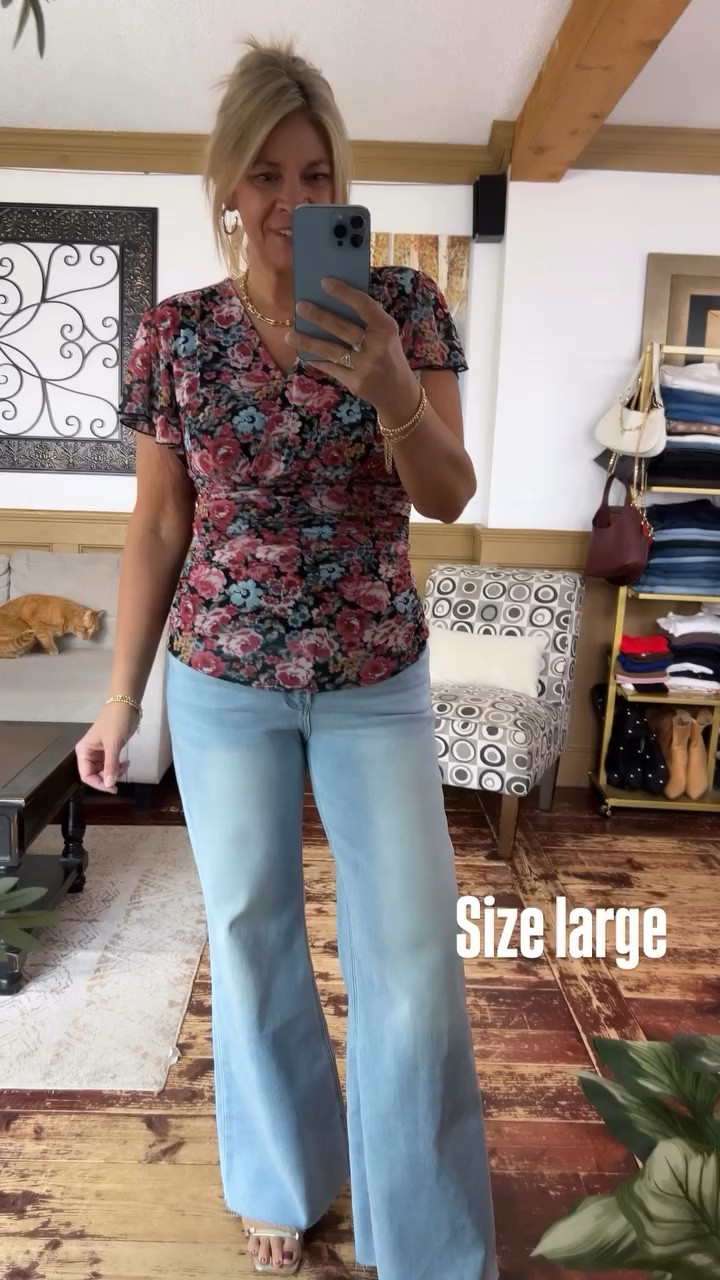 Size large in my top and 10/30 in the flare jeans 👖 

#LTKSeasonal #LTKMidsize #LTKOver40