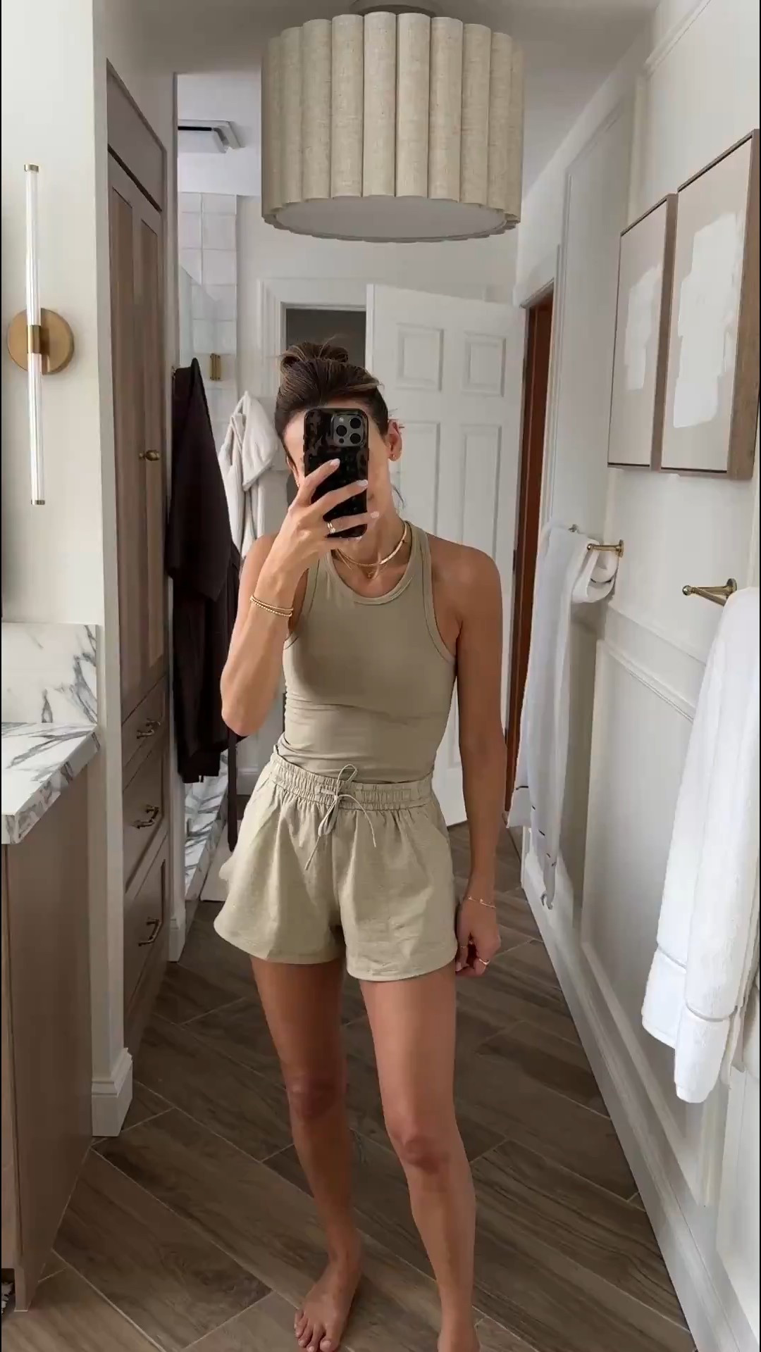 A comfy everyday outfit for the athleisure lovers out there 🤍 This was a popular duo that you all shopped like crazy! I love the neutral color combo and the flowy fit on these shorts. The tank is breathable and ideal for warm weather while still offering great coverage. I’m also a big fan of the jersey material on these shorts — perfect for workouts, walks, running, or just lounging at home! 

#LTKActive #LTKFindsUnder100 #LTKWatchNow