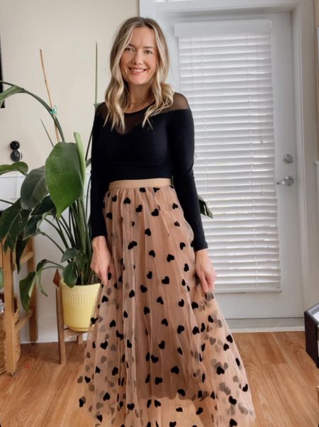 This bodysuit is legit the best! All the styles it comes in is a staple in my closet and great to pack it folds down to nothing! Love this tulle skirt with hearts!

Valentines outfit Galentines outfit 
Winter outfit #valentines #heartskirt #valentinesoutfit #winteroutfitidea

#LTKMostLoved #LTKfindsunder50 #LTKstyletip
