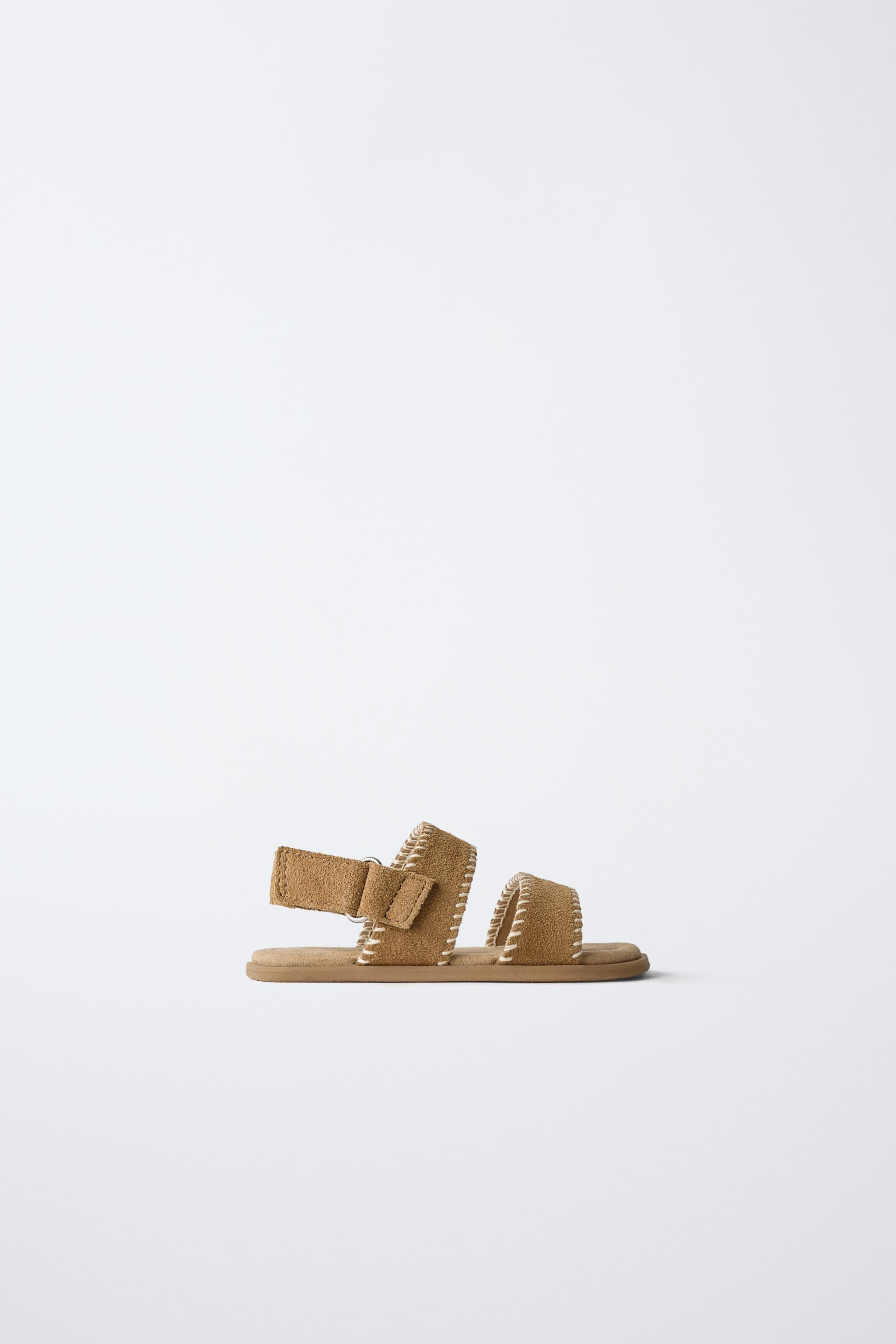 100% cowhide leather barefoot sandals. Hook-and-loop strap closure at the back. Flexible rubber s... | Zara US