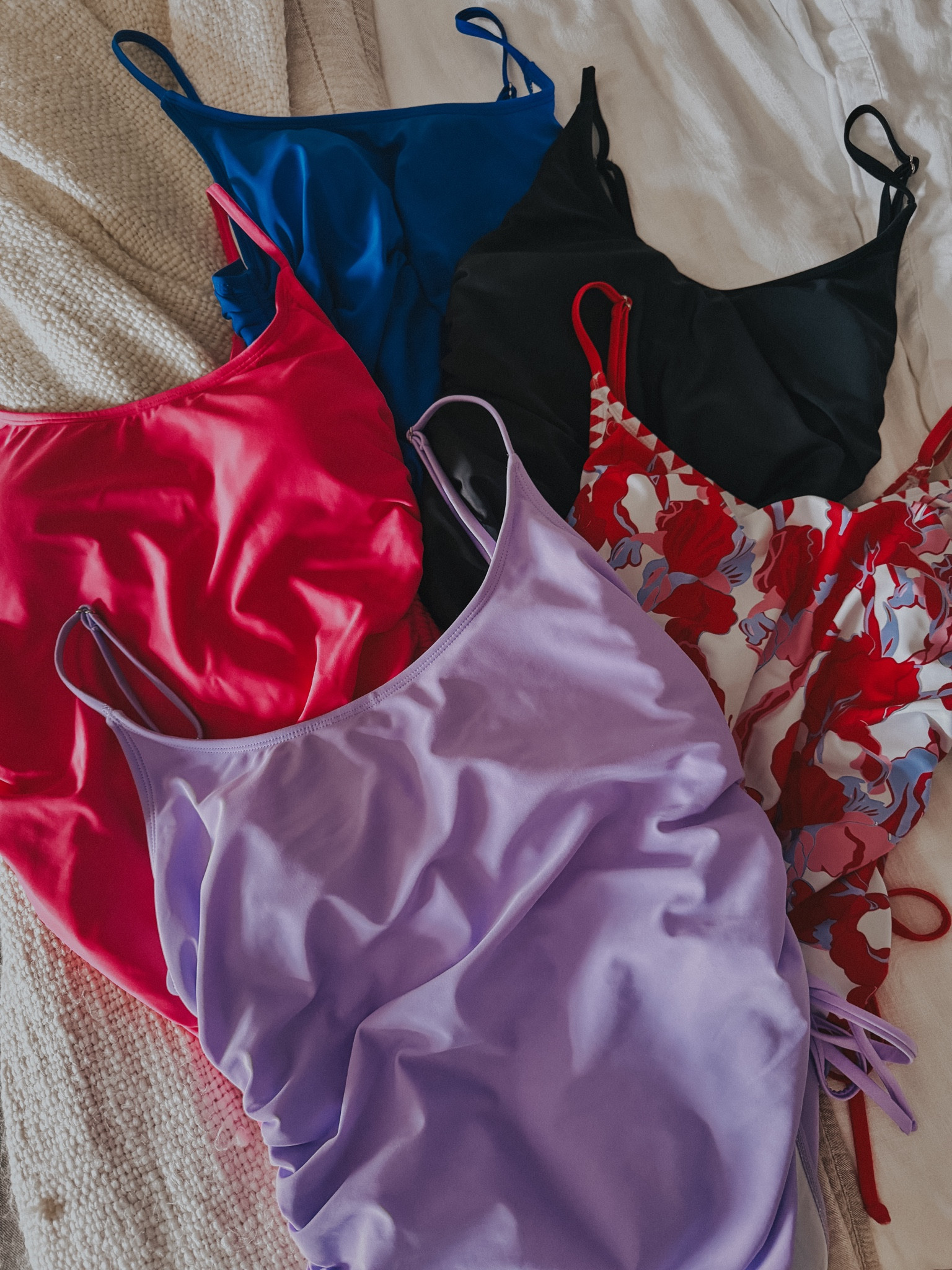 The BEST one-piece swimsuit I’ve ever owned! You can’t be the price and the colors are adorable. 

Adjustable side cinches, ruching across the stomach, coverage in the front and back - but still cute!

I’m usually a size 10, but I sized up and wear an XL in the suite. If you like a tighter fit, go with your normal size!

#LTKFindsUnder50 #LTKSwim