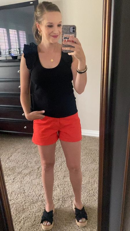 This darling outfit is brought to you by Old Navy and Target! This ruffle sleeve tank top is absolutely adorable and on sale for $14 paired with this orange high waisted 3 inch shorts that are just $12!! I added my black wedges from Target to make a cute and easy outfit of the day! 

#LTKSaleAlert