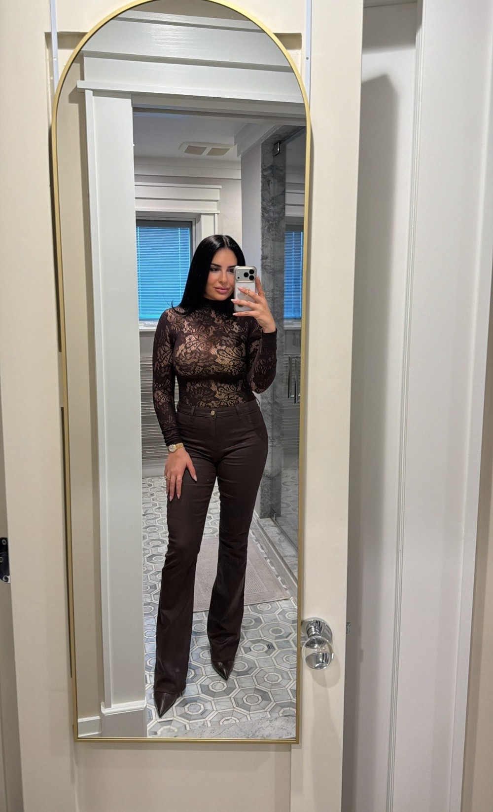 Brown lace top, brown coated jeans, brown booties 