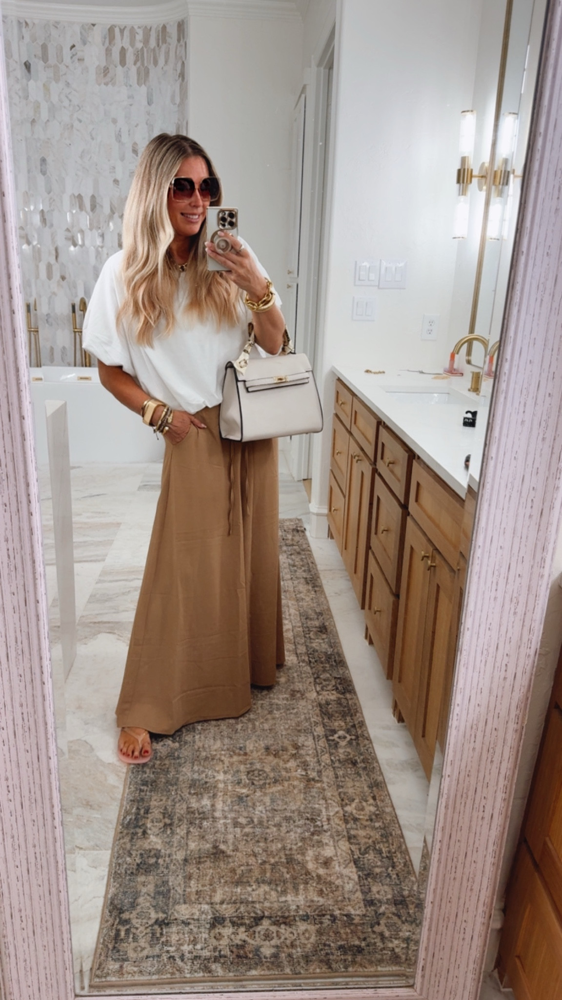 Travel outfit track pants fit true to size and comes in petite to extra tell lengths. Wearing medium tall.

 Summer shoes. Aerie.Travel outfit. San diego . Free people.. Jelly sandals size up in between sizes. Summer sandals. Miu miu slides. Crochet. Sized up to large in tennis dress. Pickleball outfit. Summer fashion. Summer outfit. Beach vacation outfit. Jeans size down one size to 28 (normally 30. Too sized up. Swimsuit coverup. Beach vacation outfits. Dress fits true to size. Looks like zimmermann. Outfit for my son’s award ceremony. 

. Walmart. Anthropologie. Travel outfits. Vacation outfits beach. Zimmermann. Aerie. Travel outfit. Beach outfit. Linen pants. Skirt fits true to size. Graduation dresses. Graduation outfit. Wedding guest dress. Summer wedding guest. Vacation outfits. Resort wear. Summer outfits. Workwear. Mother’s Day outfit. All fit true to size. Workout outfits. Summer outfits. Madewell looks for less. Walmart fashion. 
Travel outfits. Memorial Day weekend outfit. July 4th outfits. Lake outfit. Shorts. Alo looks for less. Athleisure. Walmart. Walmart fashion. Springoutfits 2036. Workout. Sports Lon outfit. Lululemon. Freee people. Sized up one size to large in the romper for this comfy fit. White button down. Shorts. . Travel outfits. Spring fashion. 2026. Aerie. Plus
 size fashion. Vacation outfit. Spring outfits 2026. Sports outfit. Spring outfits 2026. Spring fashion. Easter. Jumpsuit. Romper. Memorial Day weekend. GRWM. Sports mom outfit