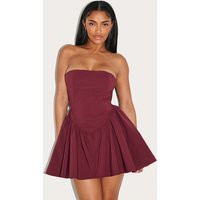 Shape Red Stretch Woven Dipped Waist Mini Skater Dress | PrettyLittleThing US