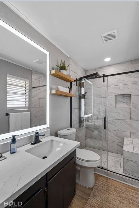 Ultra Modern Scandi Farmhouse aesthetic for this master en-suite bathroom. I just had a vision of a clean, ultra modern, and charming spa like feel, for this space. 


#modernfarmhouse #bathroomreno #walkinshower #ledmirror 

#LTKhome