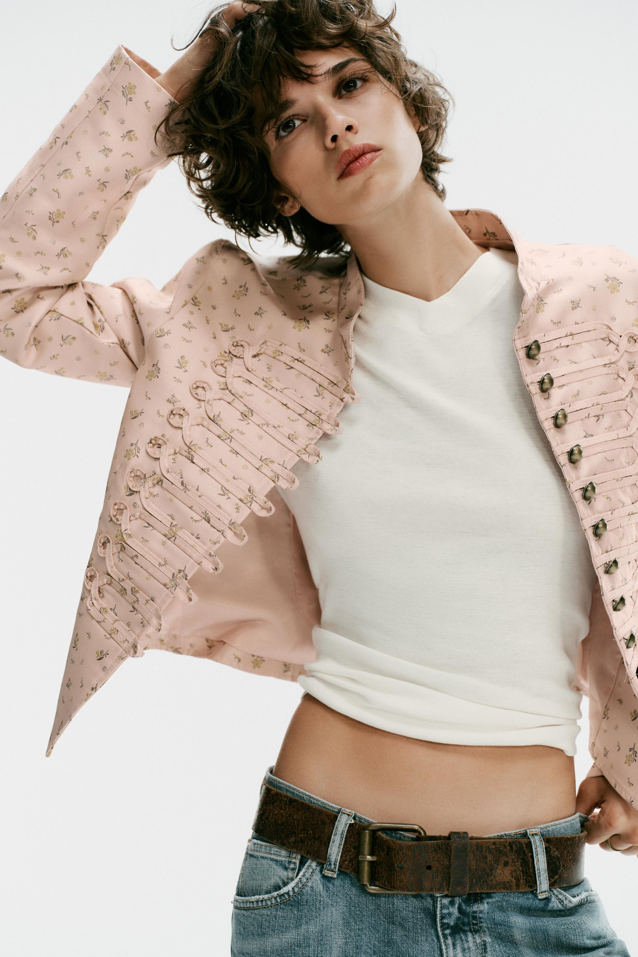 Tailored blazer with a high neck and long sleeves. Matching fabric appliqu\u00e9 detail on the fr... | Zara US