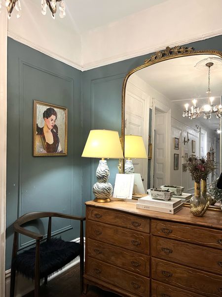 Foyer- blue paint color, gold mirror, table lamp, framed portrait 

#LTKstyletip #LTKhome